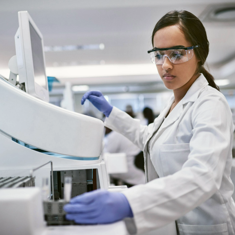A scientist in a pharma lab carrying out testing
